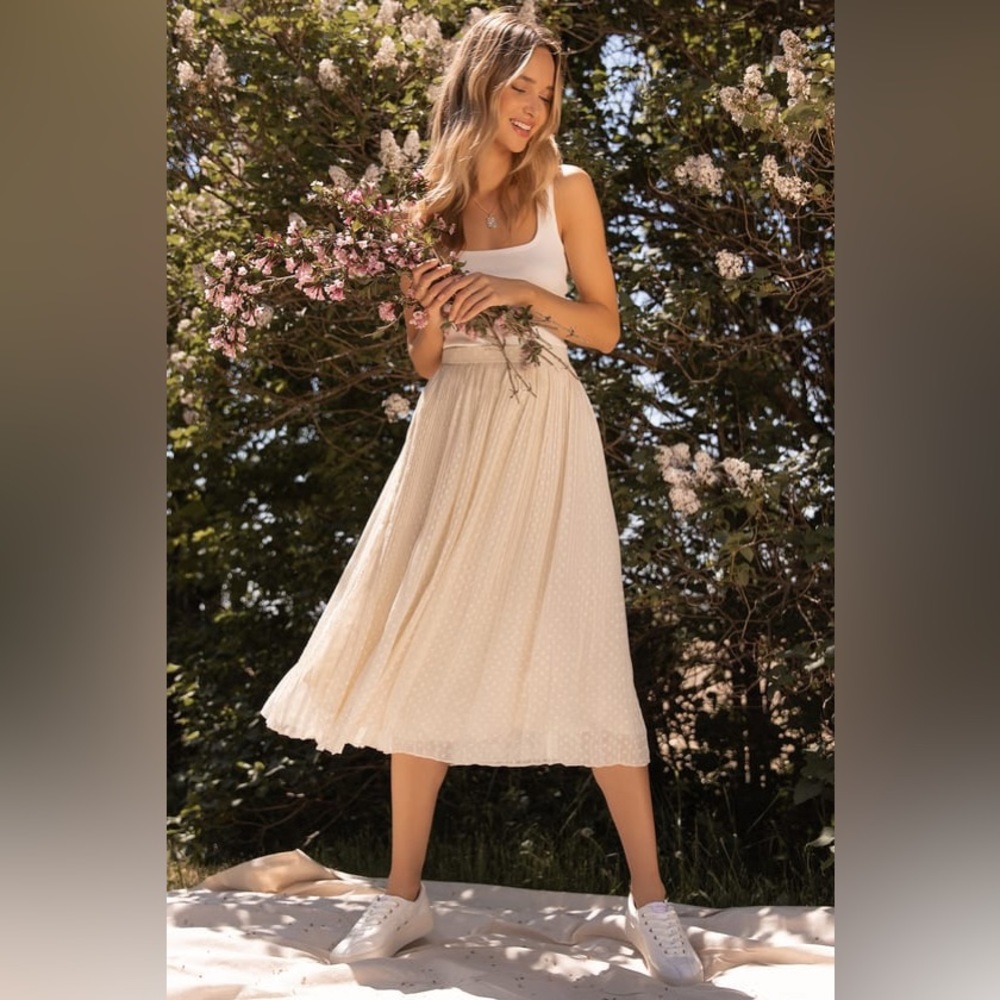 Lulus Exclusive! Ivory Pleated Swiss Dot Midi Skirt! Swiss dots and pleating.